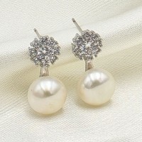 White pearl drop earrings with sparkling crystal detail